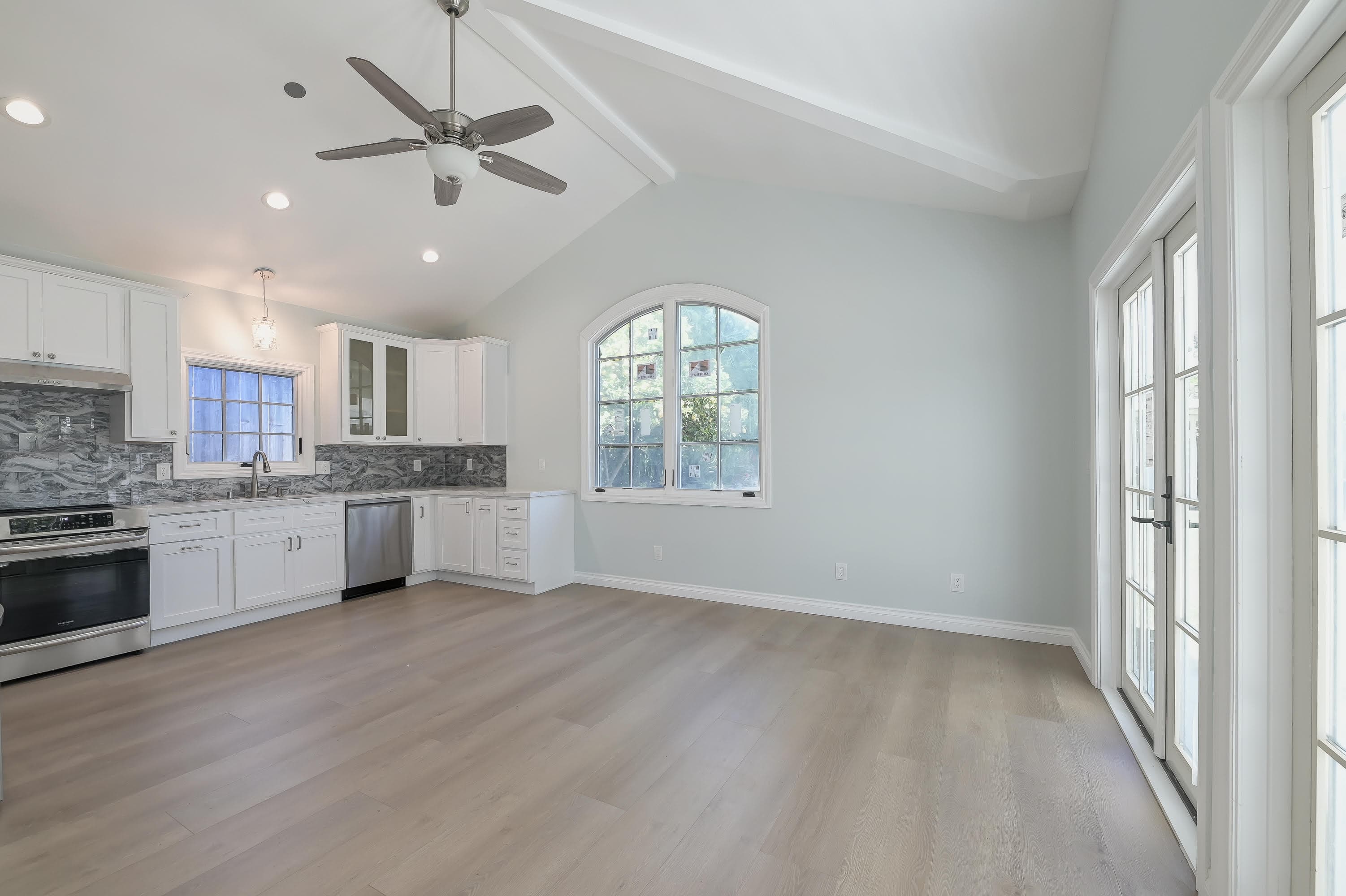 Open-concept vaulted ceiling living space — Navarro's Custom Homes & ADUs